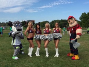 The Ottawa RedBlacks cheer squad, Big Joe and Thor the mascots pose for the camera